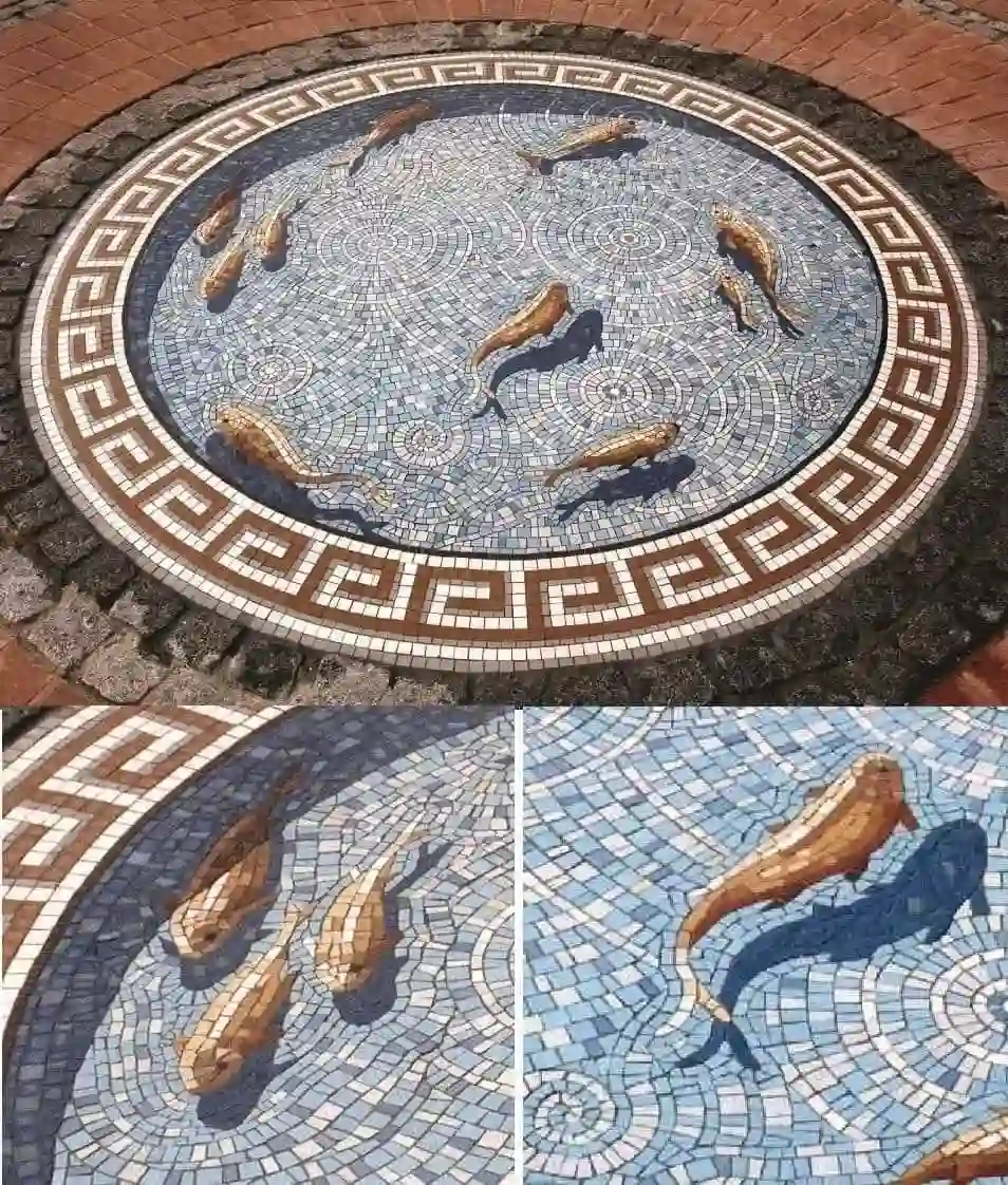 Fish pond mosaic, by Gary Drostle, adorns a public garden in Croydon, Surrey, UK.